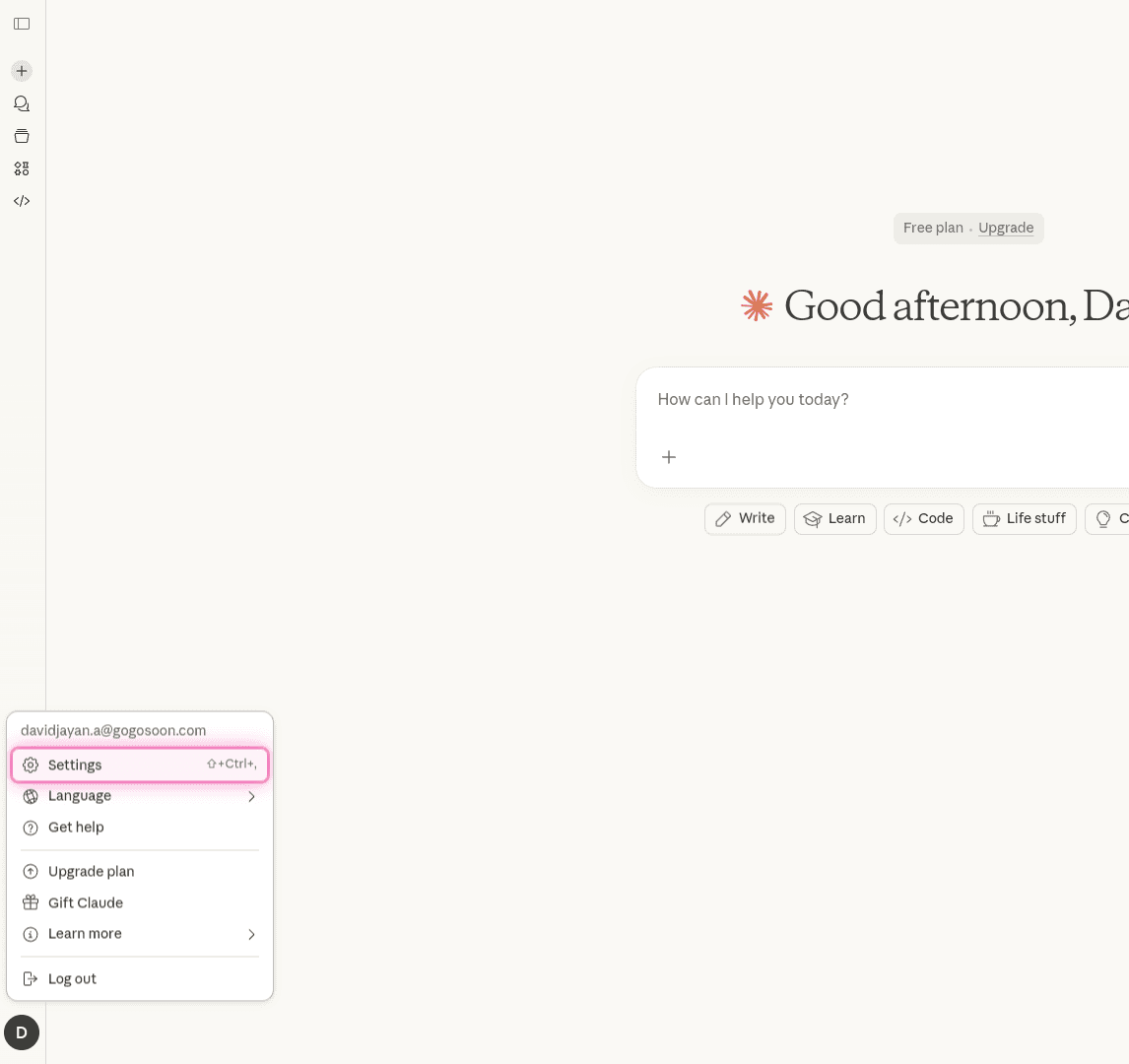 Claude.ai user menu with Settings option